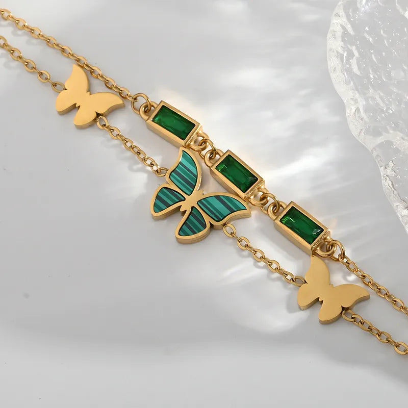 ZARAHE Emerald Wings Bracelet – Dual Chain Elegance with Butterfly Charm