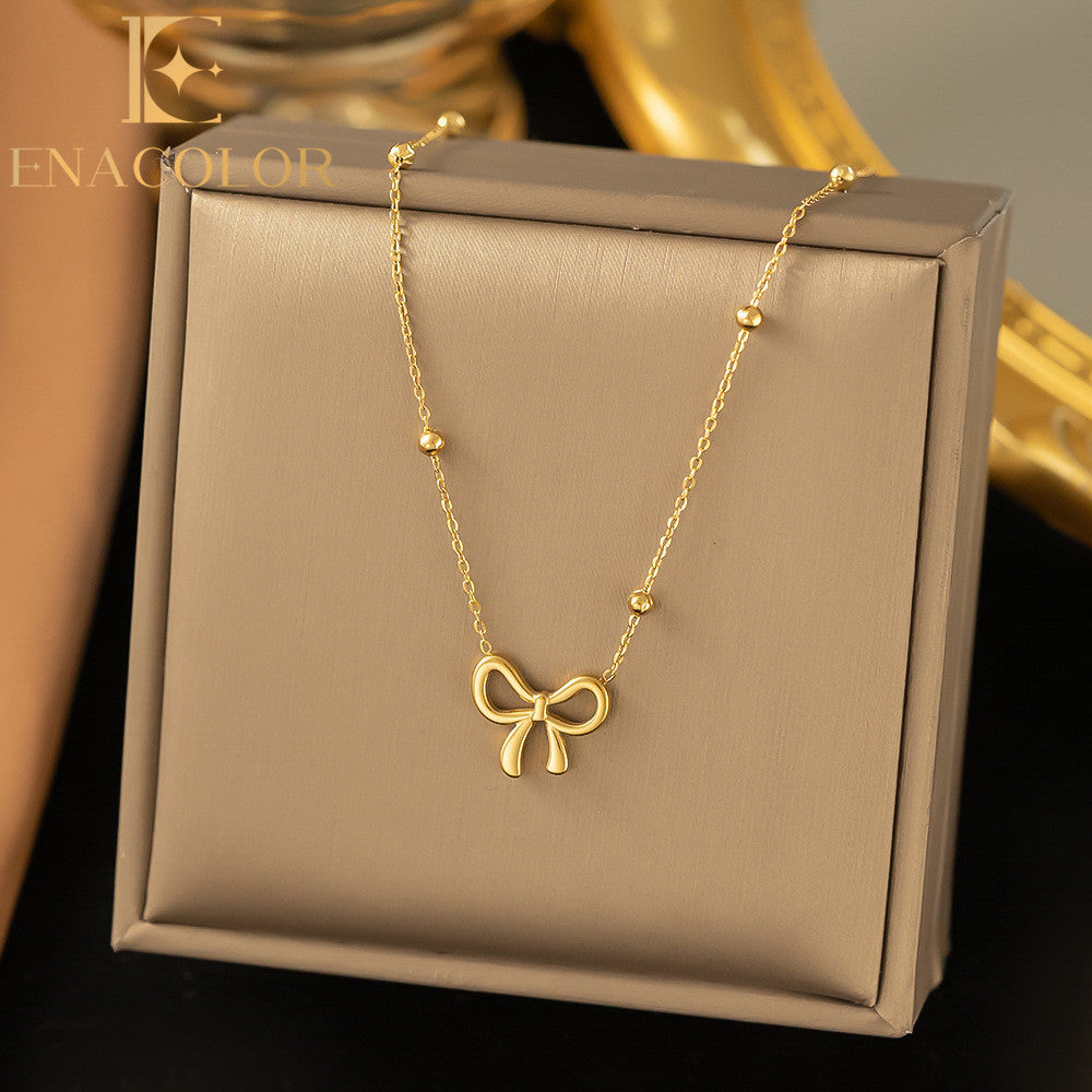 ZARAHÉ Luxe Ribbon Charm Necklace