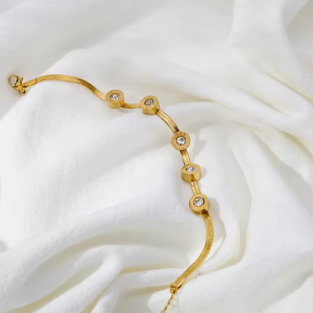 ZARAHÉ Elegant Gold-Plated Bracelet with Crystal Flower Accents