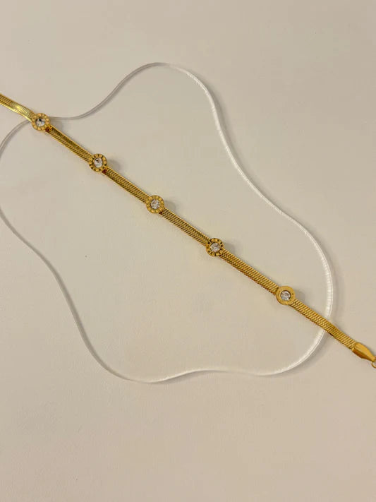 ZARAHÉ Elegant Gold-Plated Bracelet with Crystal Flower Accents