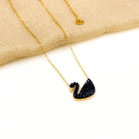 ZARAHE Midnight Swan Necklace – Black & Gold Charm